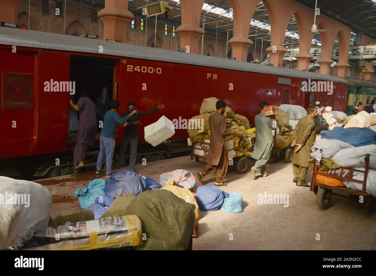 Pakistani Post Office Worker Sorts Mails After It Was Unloaded