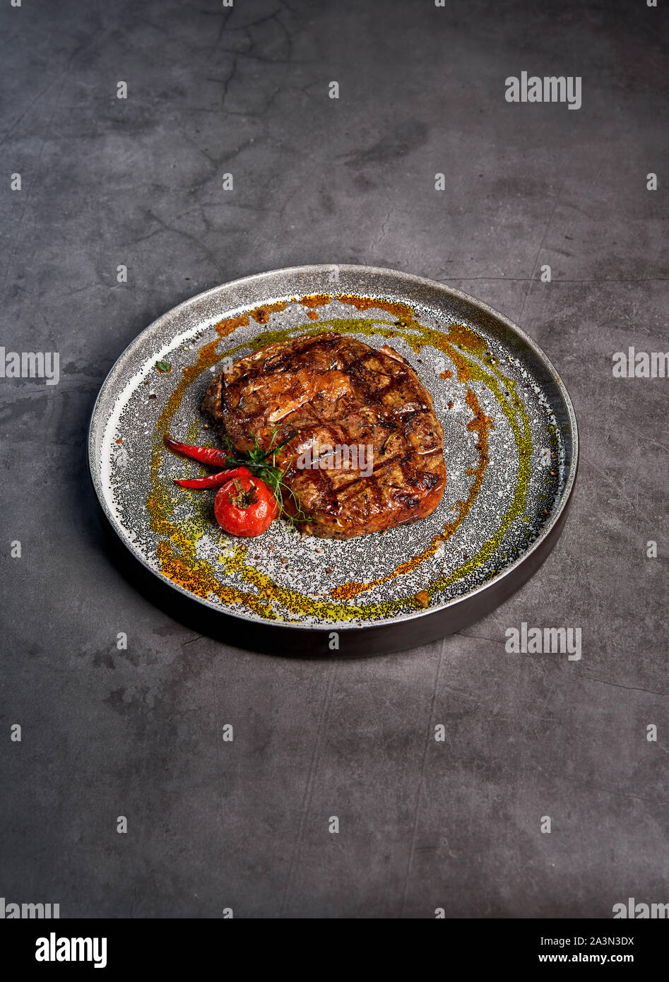 chic meat steak with pepper on a plate Stock Photo