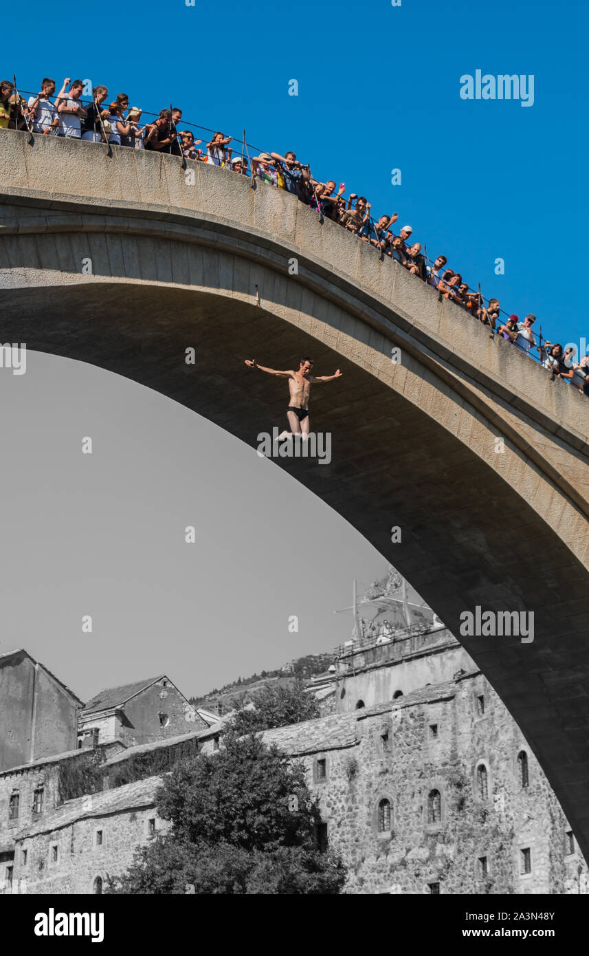 A picture of one of the bridge jumpers in Mostar, Bosnia and ...