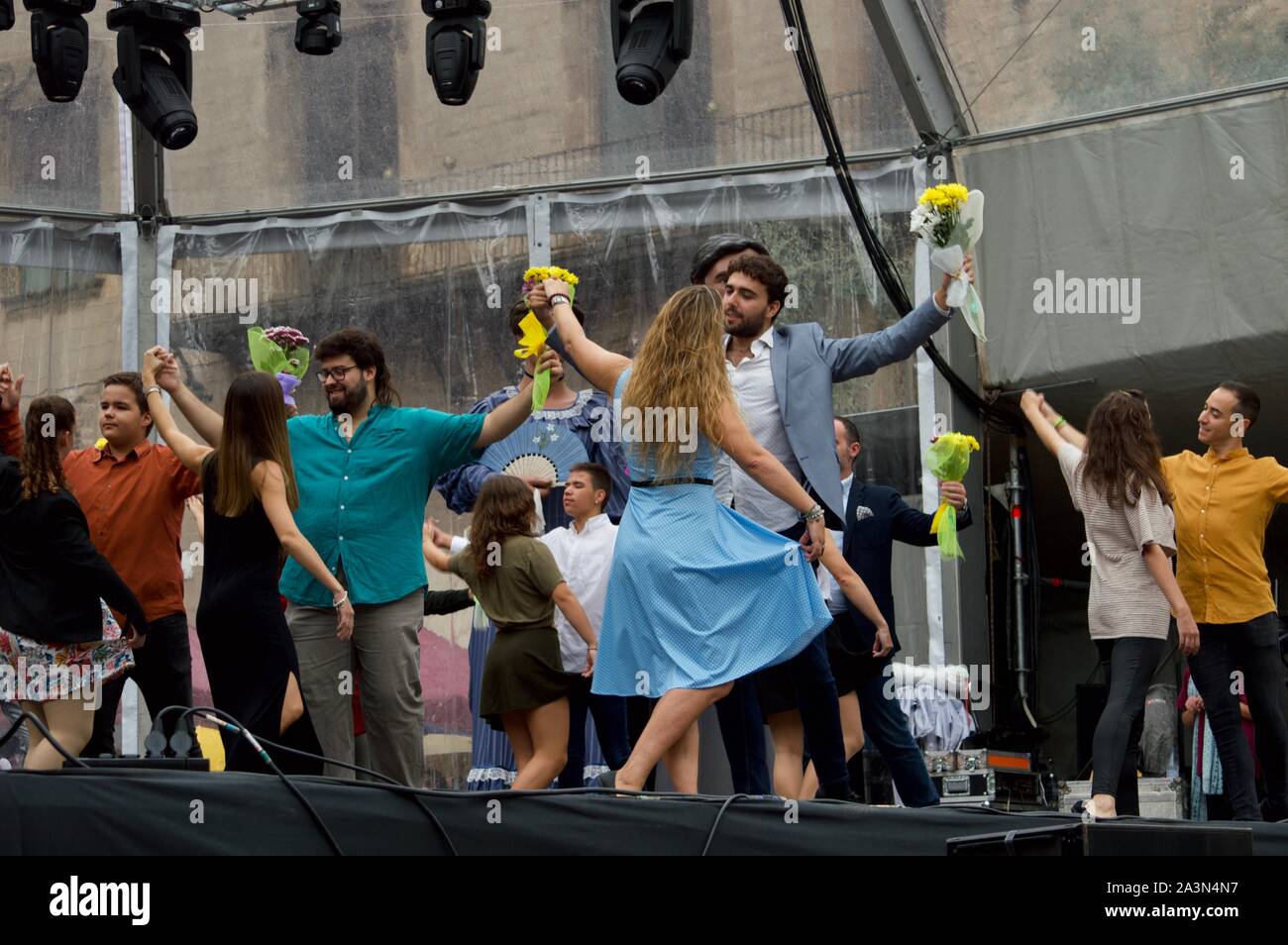 Couples dancing together at La Merce Festival in Barcelona, Spain Stock Photo