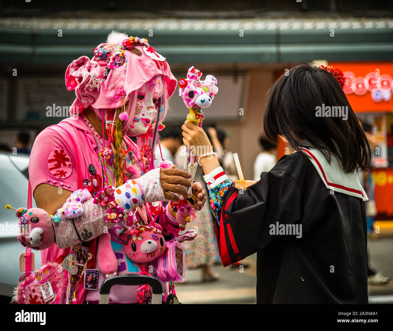 Cosplay Street scene. Kawaii means cute and is helpful when selling goods. Here is a seller on Takeshita Street in Tokyo, Japan Stock Photo