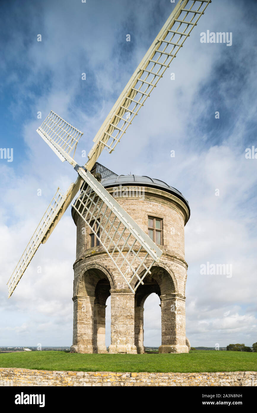 A close up view of Chesterton Windmill, a landmark stone arched structure in low bright sunlight. Stock Photo