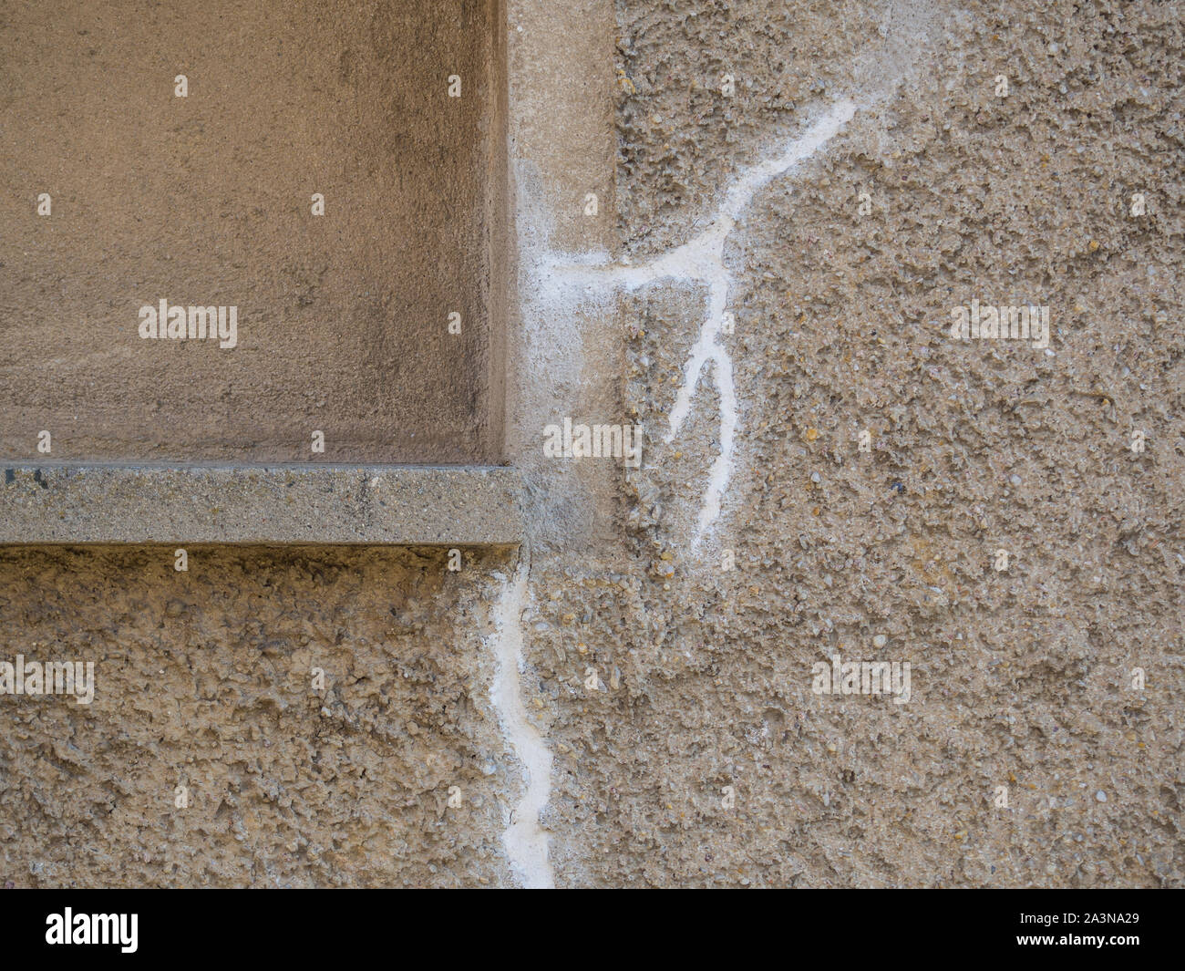 plastered crack in the wall Stock Photo