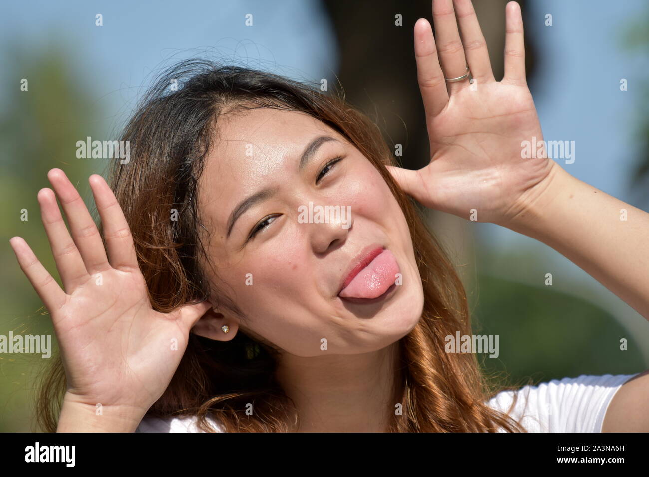 Woman Making Funny Faces Stock Photo