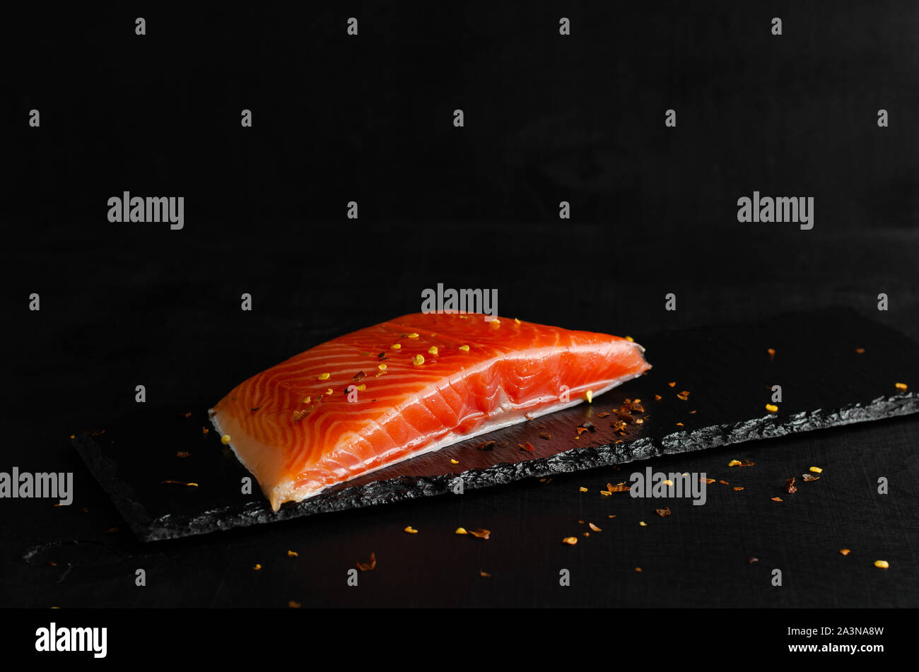 Salmon fillet black background hi-res stock photography and images - Alamy