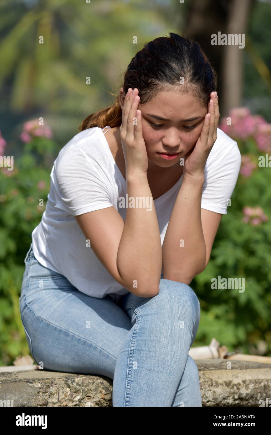 Lonely beautiful young woman hi-res stock photography and images - Alamy