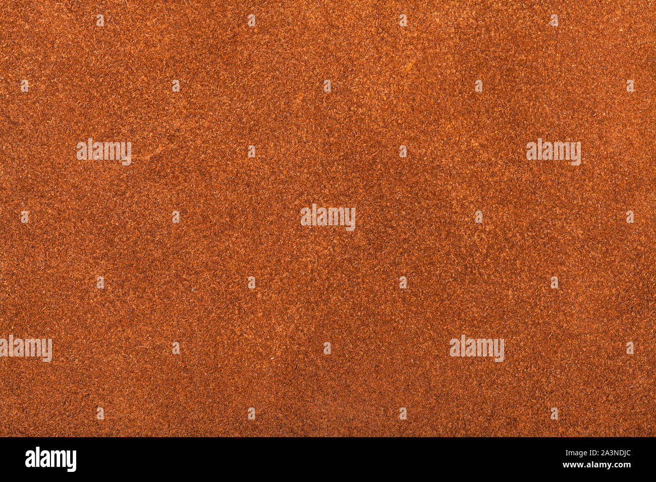 textured background from orange brown suede close up Stock Photo