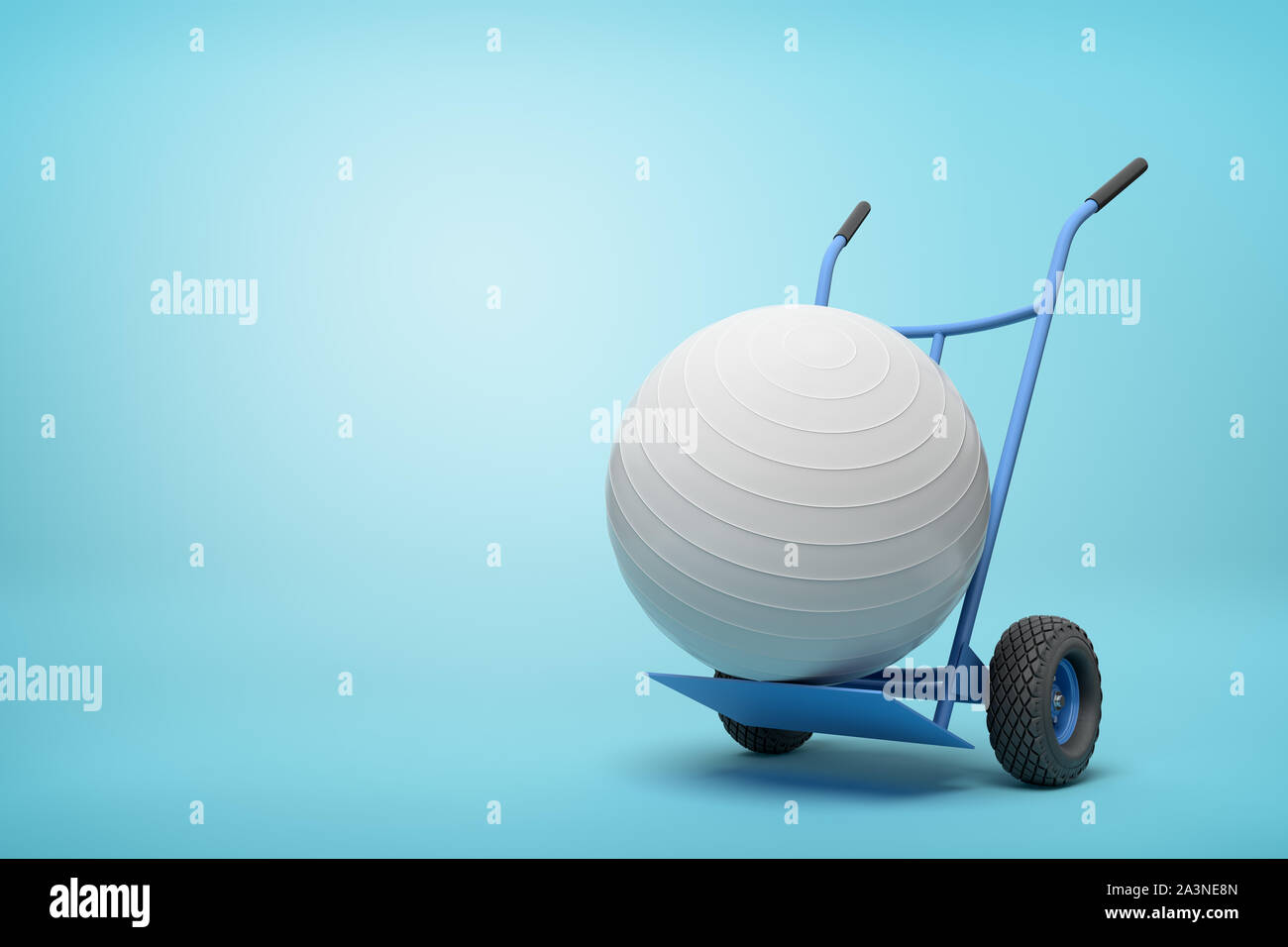 3d rendering of white yoga exercise ball on blue hand truck on light-blue background with copy space. Stock Photo
