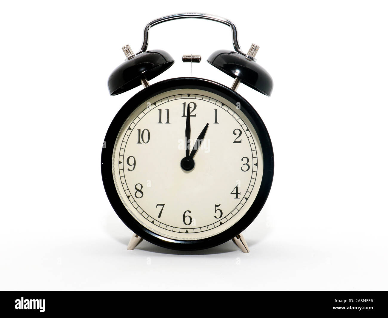 Oldstyle alarm clock, black and white, it's one o'clock Stock Photo
