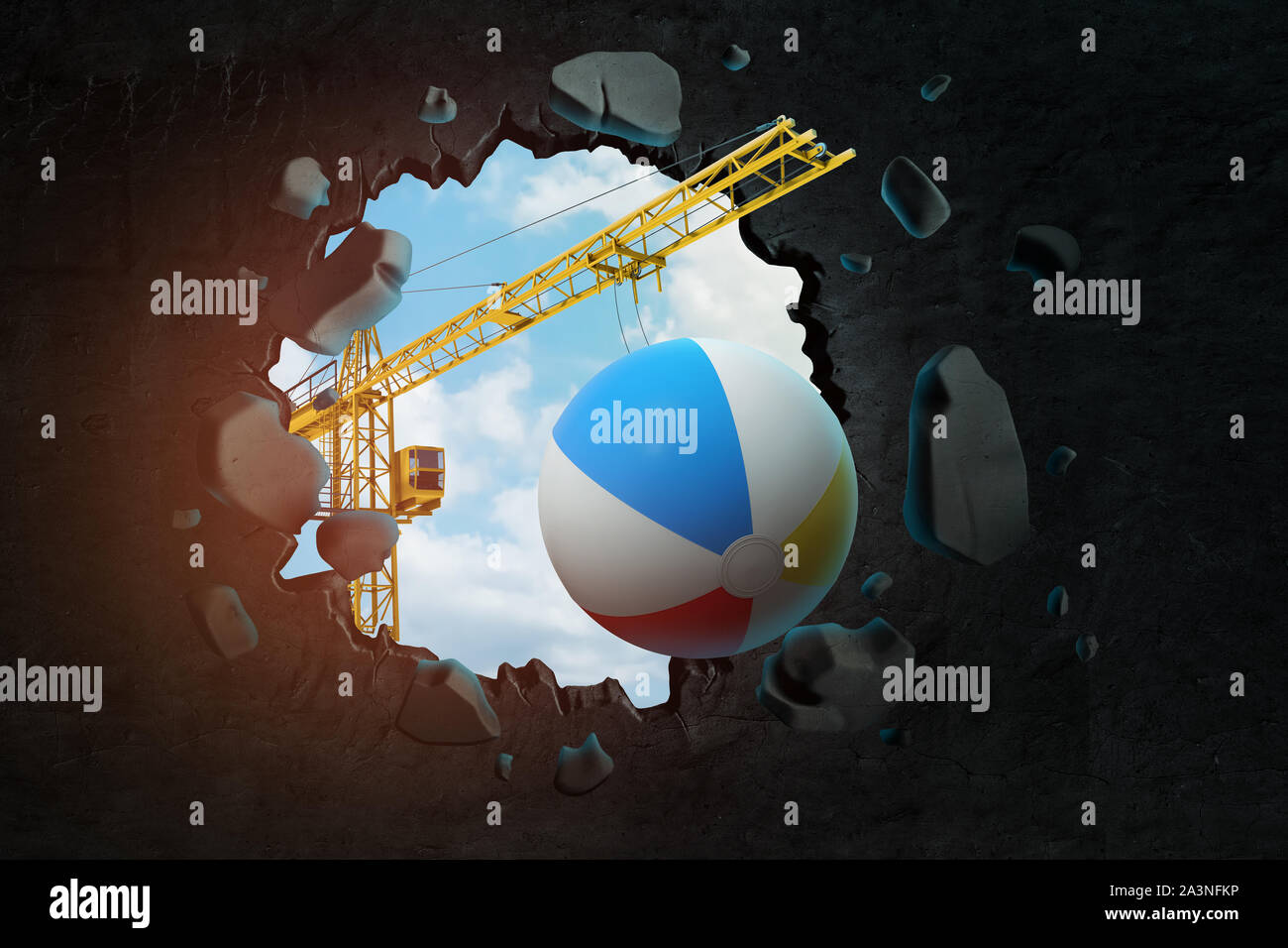 3d rendering of hoisting crane carrying beach ball and breaking hole in black wall with blue sky seen through. Stock Photo