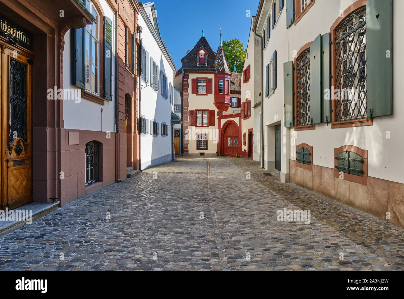 Empty Alley Amidst Buildings In City Stock Photo