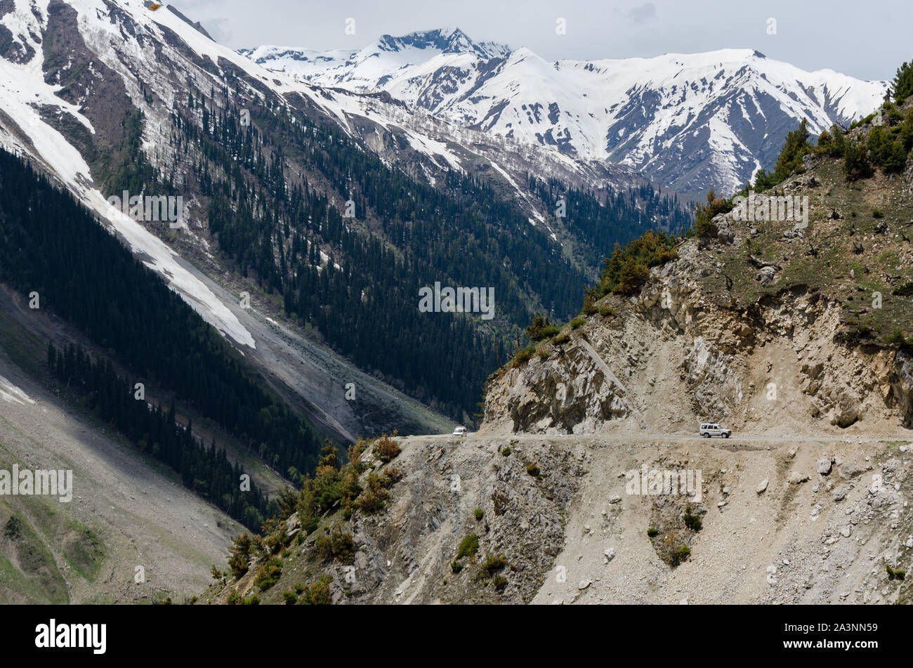 Vehicles making their way up the dangerous Zoji La Pass, Srinagar - Leh National Highway, Jammu and Kashmir, India Stock Photo