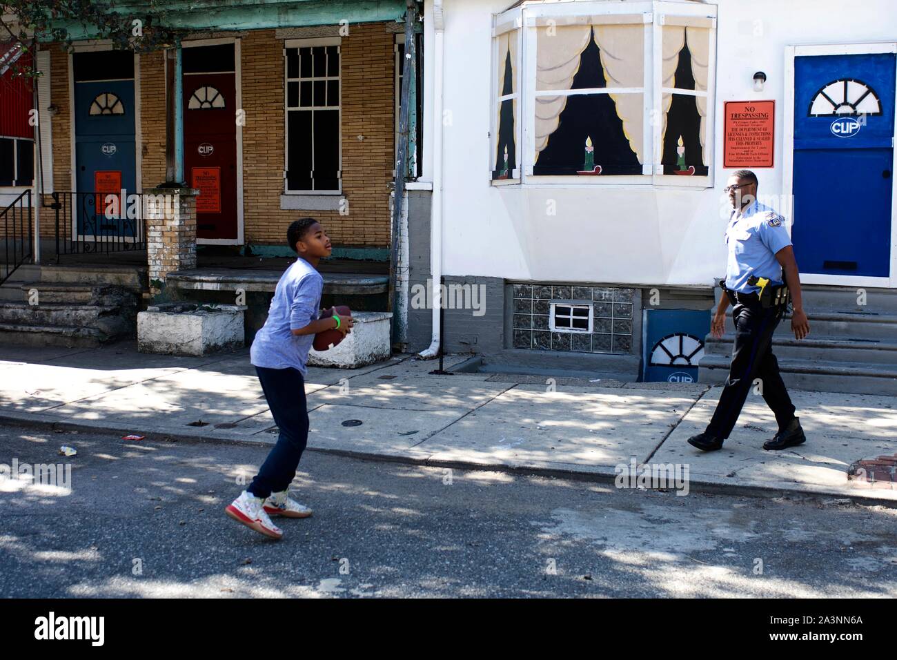 Police officers interact with youth from the community during a block party on Sunday October 5, 2019 at the site of the August Police shooting and ho Stock Photo