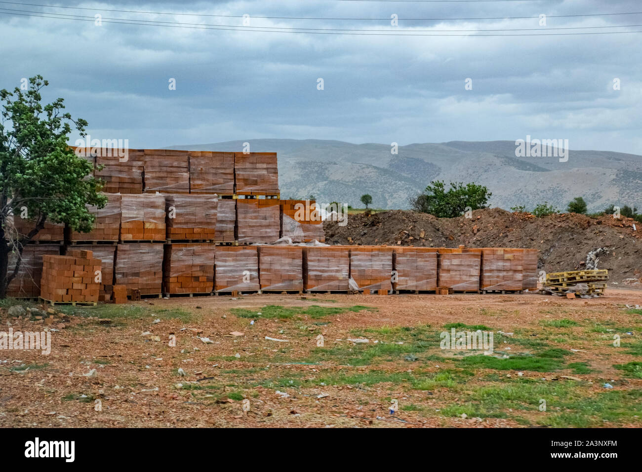 Warehouse of hollow ceramic bricks. Construction base. Stock Photo