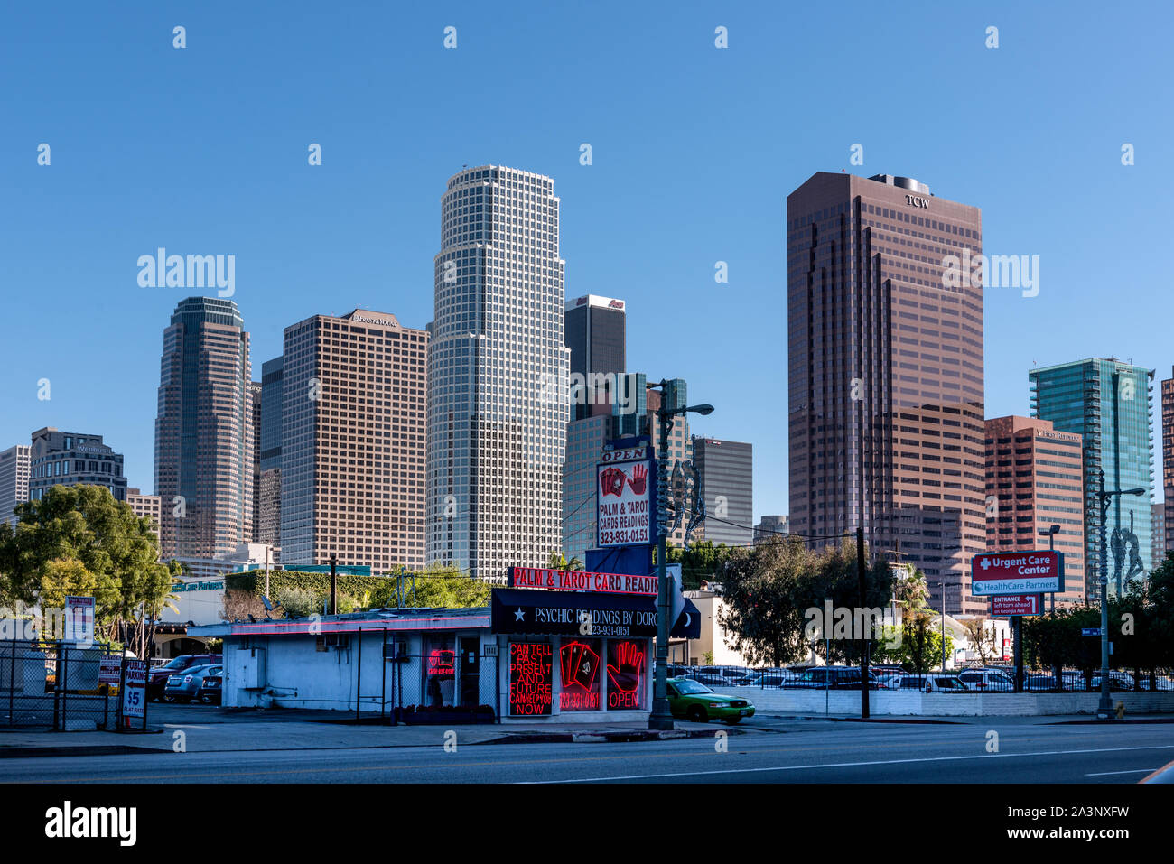 Skyline of Central Los Angeles, California, showing the contrast between  old (including a tattoo parlor, foreground, and new Stock Photo - Alamy, image size:1300x957