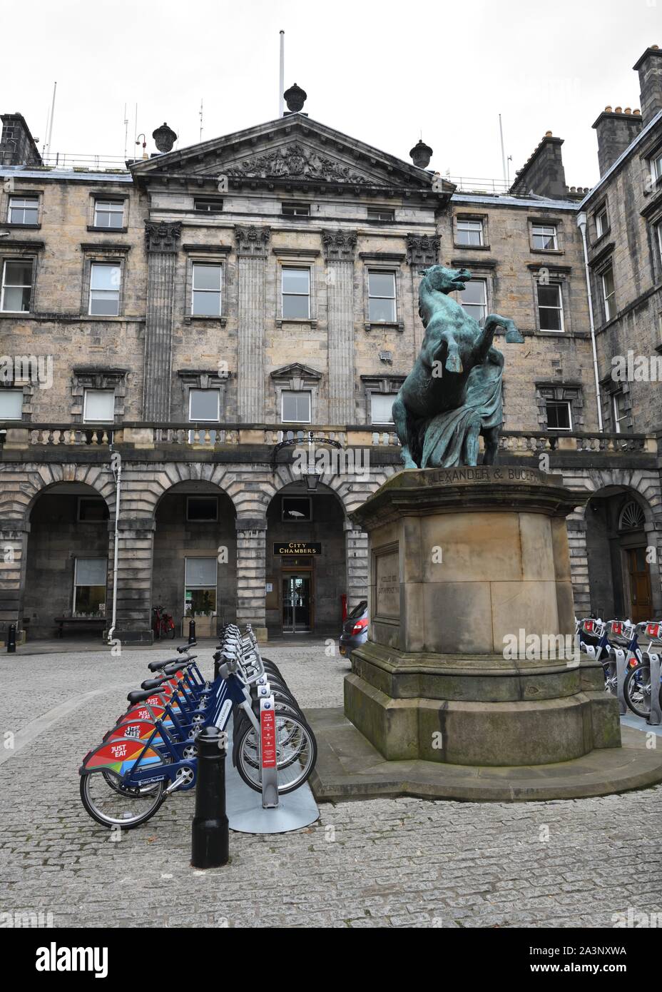 Bicycles for hire in the beautiful cobbled courtyard of the City Chambers in Edinburgh, Scotland, UK, Europe Stock Photo