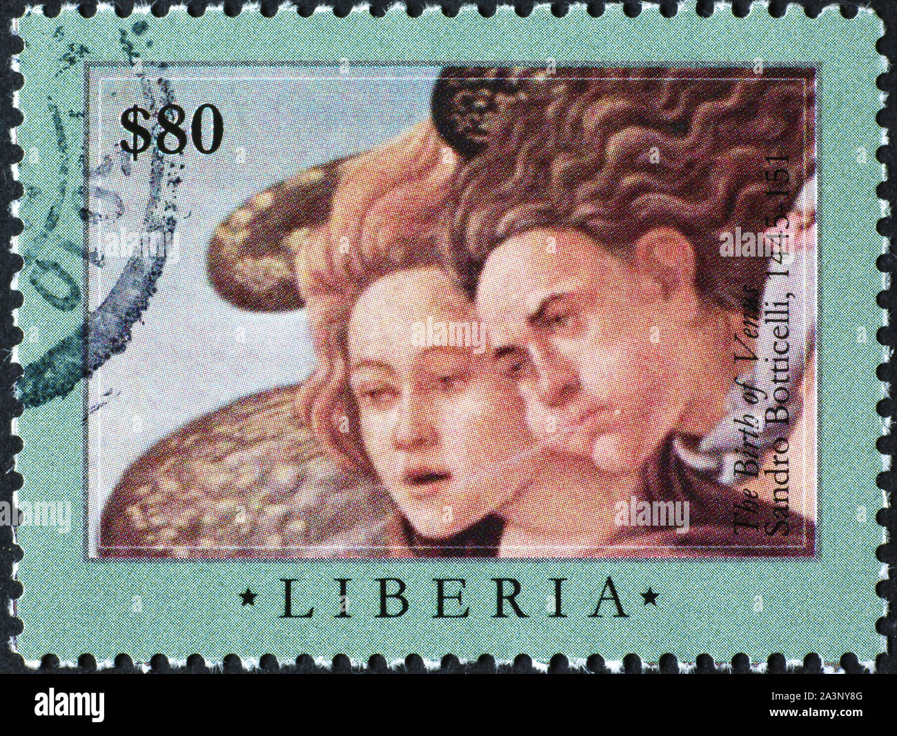Angels painted by Botticelli on postage stamp Stock Photo