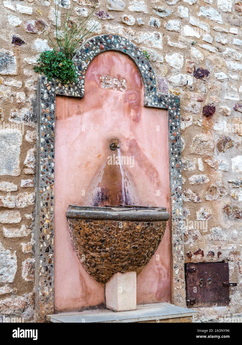 Water fountain in Roussillon, France Stock Photo Alamy