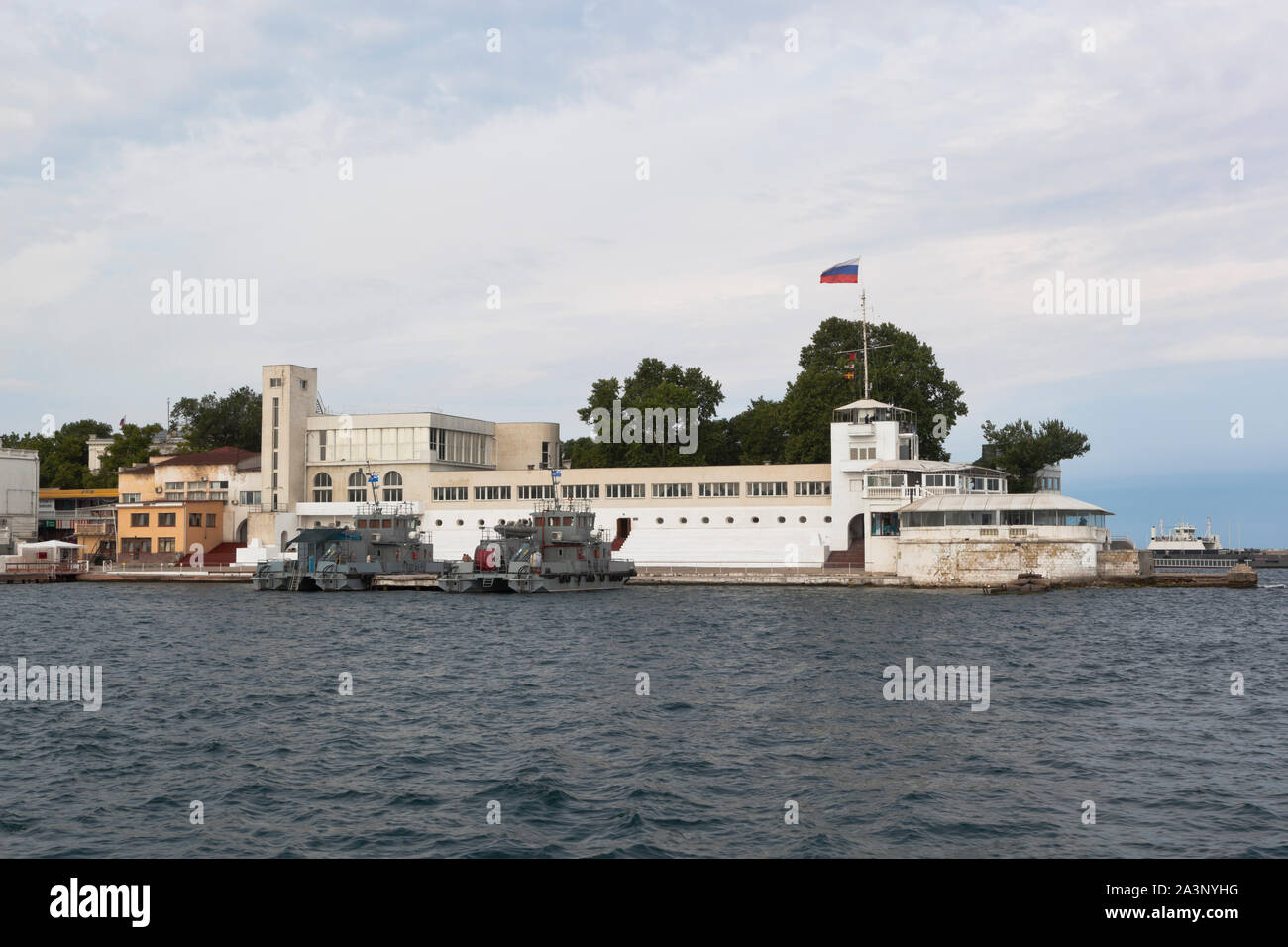 Sevastopol, Crimea, Russia - July 24, 2019: View from the sea to the building of the Water Station of the Red Banner Black Sea Fleet on the Nikolaev C Stock Photo