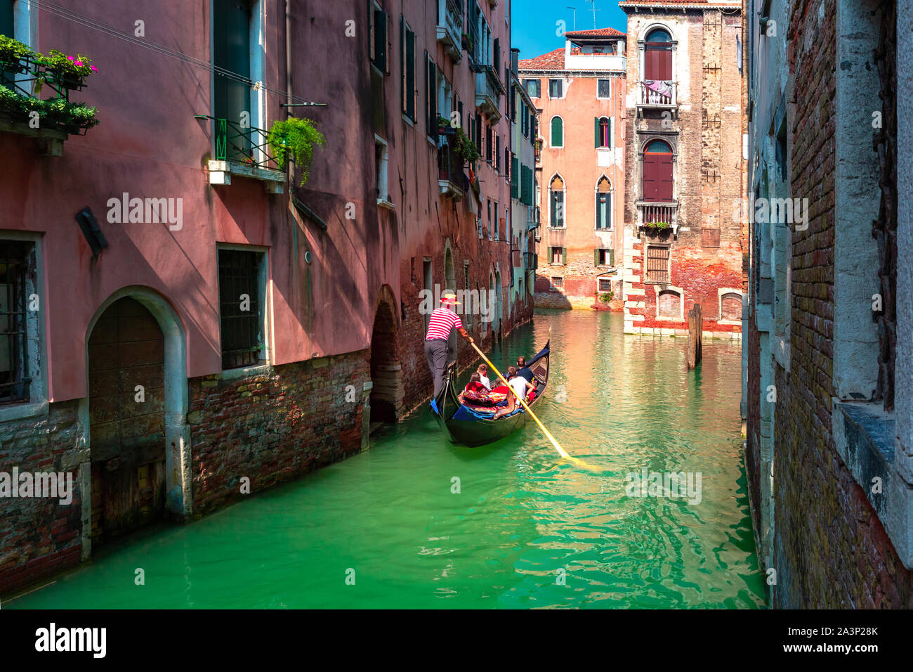 Gondolas on Canal in Venice, Italy Stock Photo