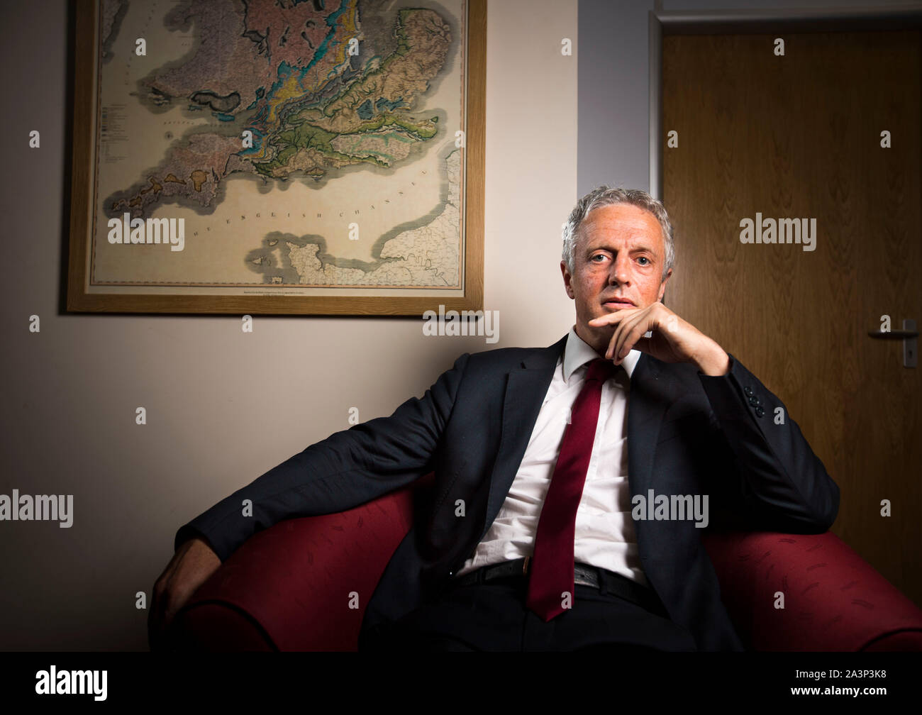 Francis Egan, CEO of Cuadrilla in front of a geological map of Britain at Cuadrilla's offices in Lichfield, Staffordshire. Stock Photo