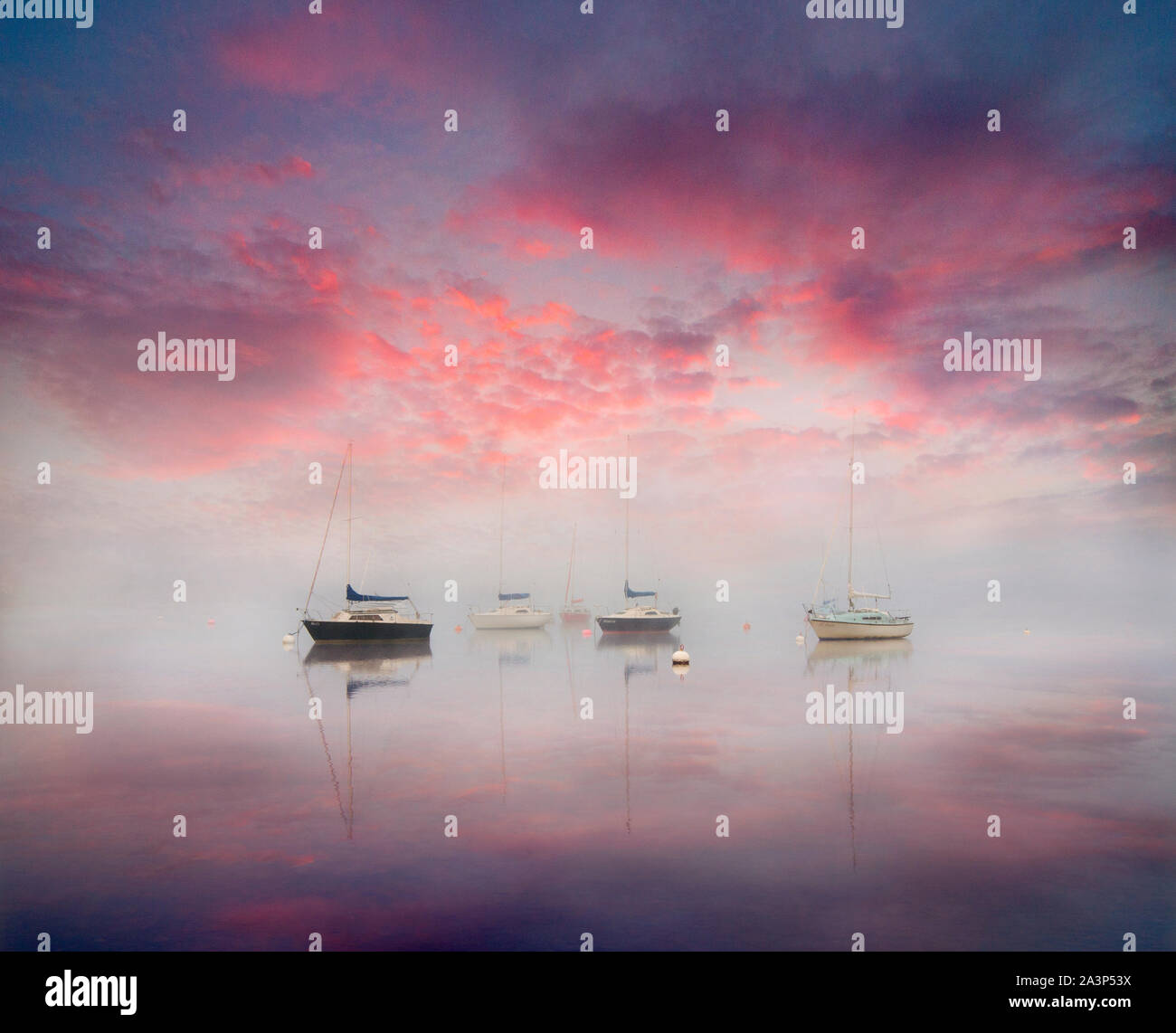 Lake Ullswater in Cumbria, England on a foggy sunrise Stock Photo