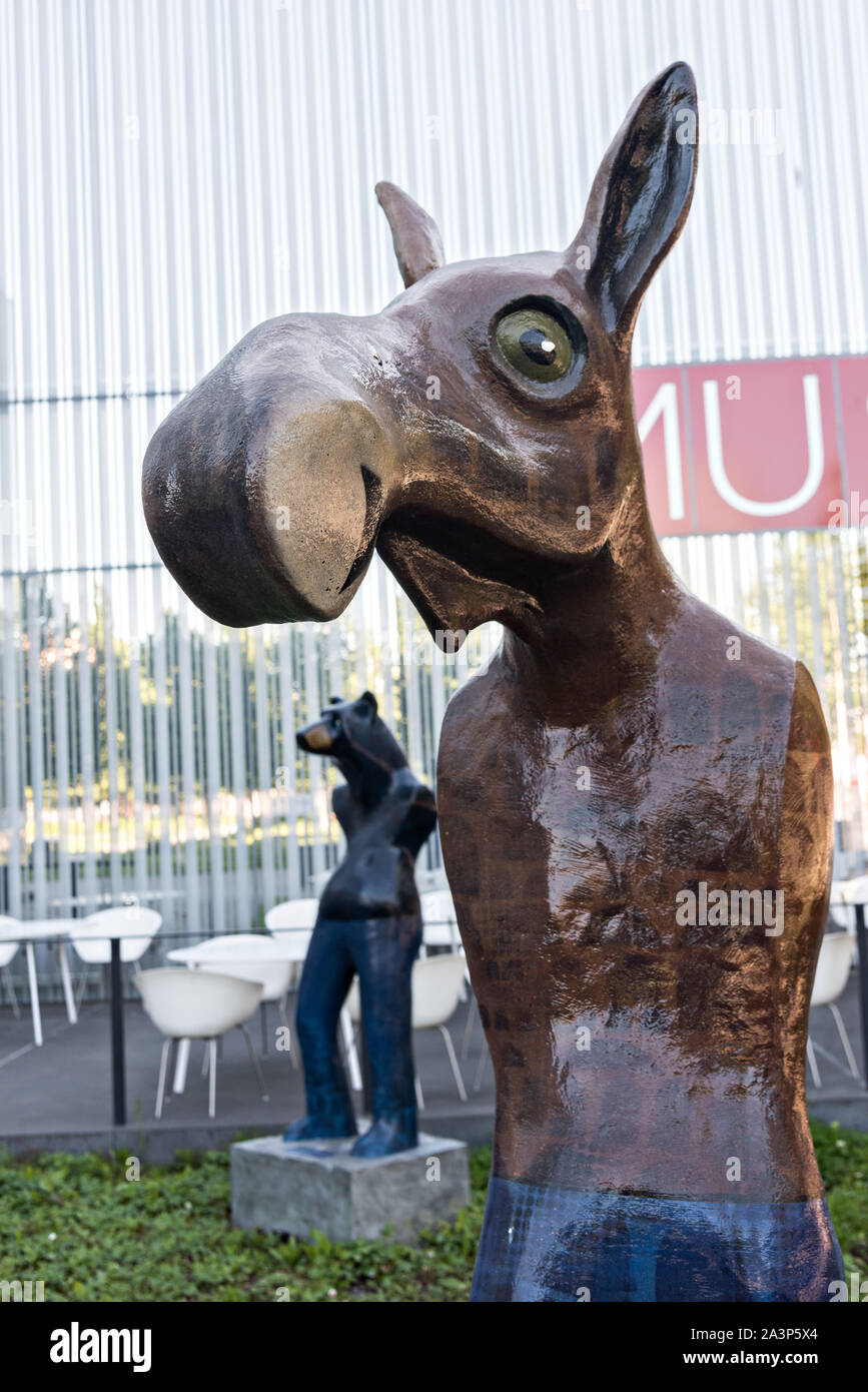 Whimsical statues of moose and bears as people by sculptor Rachelle