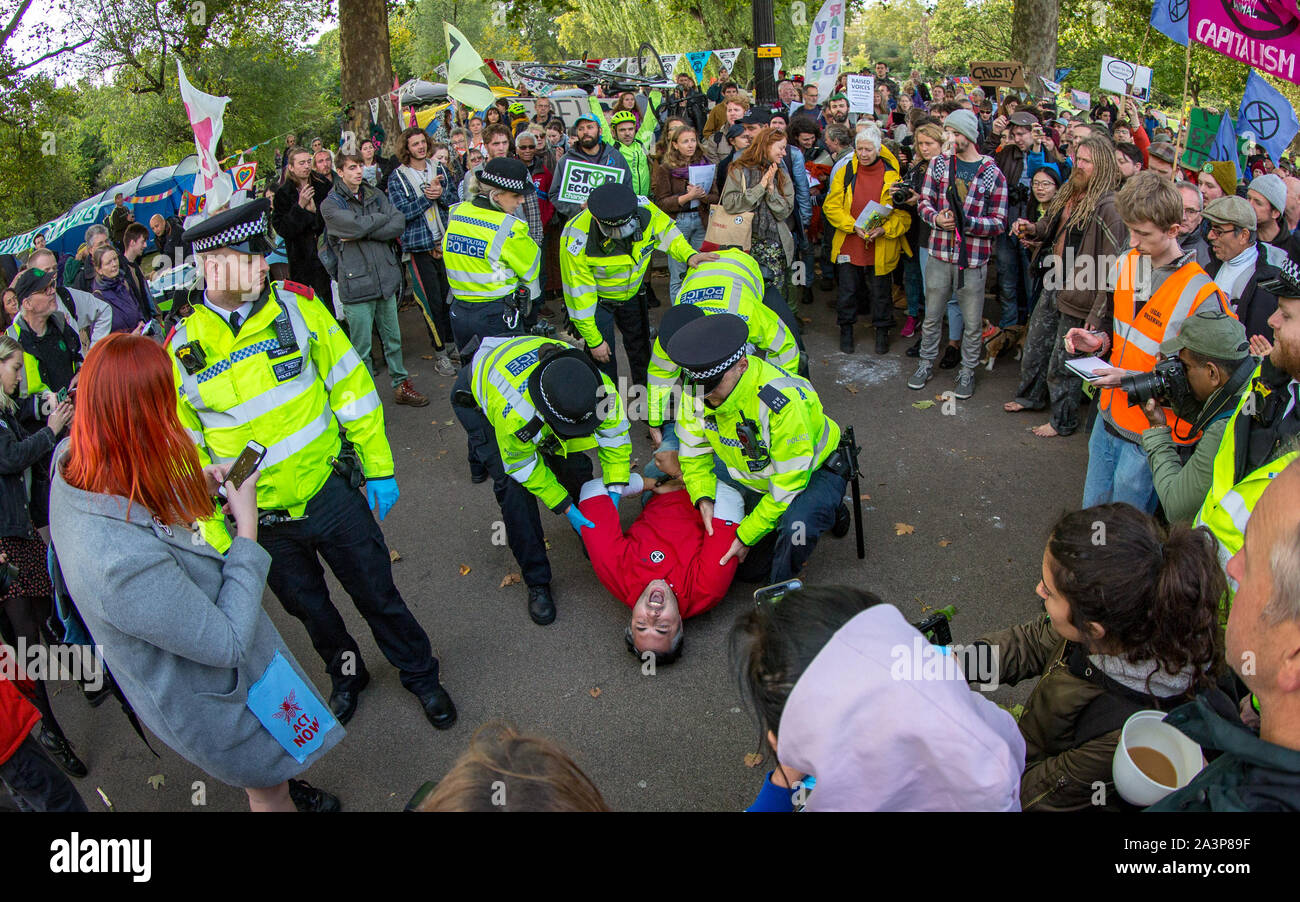 London, UK. 09th Oct, 2019. Environmental activists from Extinction Rebellion protest in London on 09 October 2019 in London, England. Protesters plan to blockade the London government district for a two week period, as part of 'International Rebellion' taking place in over 60 cities around the world, calling for decisive and immediate action from governments in the face of climate and ecological emergency. Photo by Andy Rowland. Credit: PRiME Media Images/Alamy Live News Stock Photo