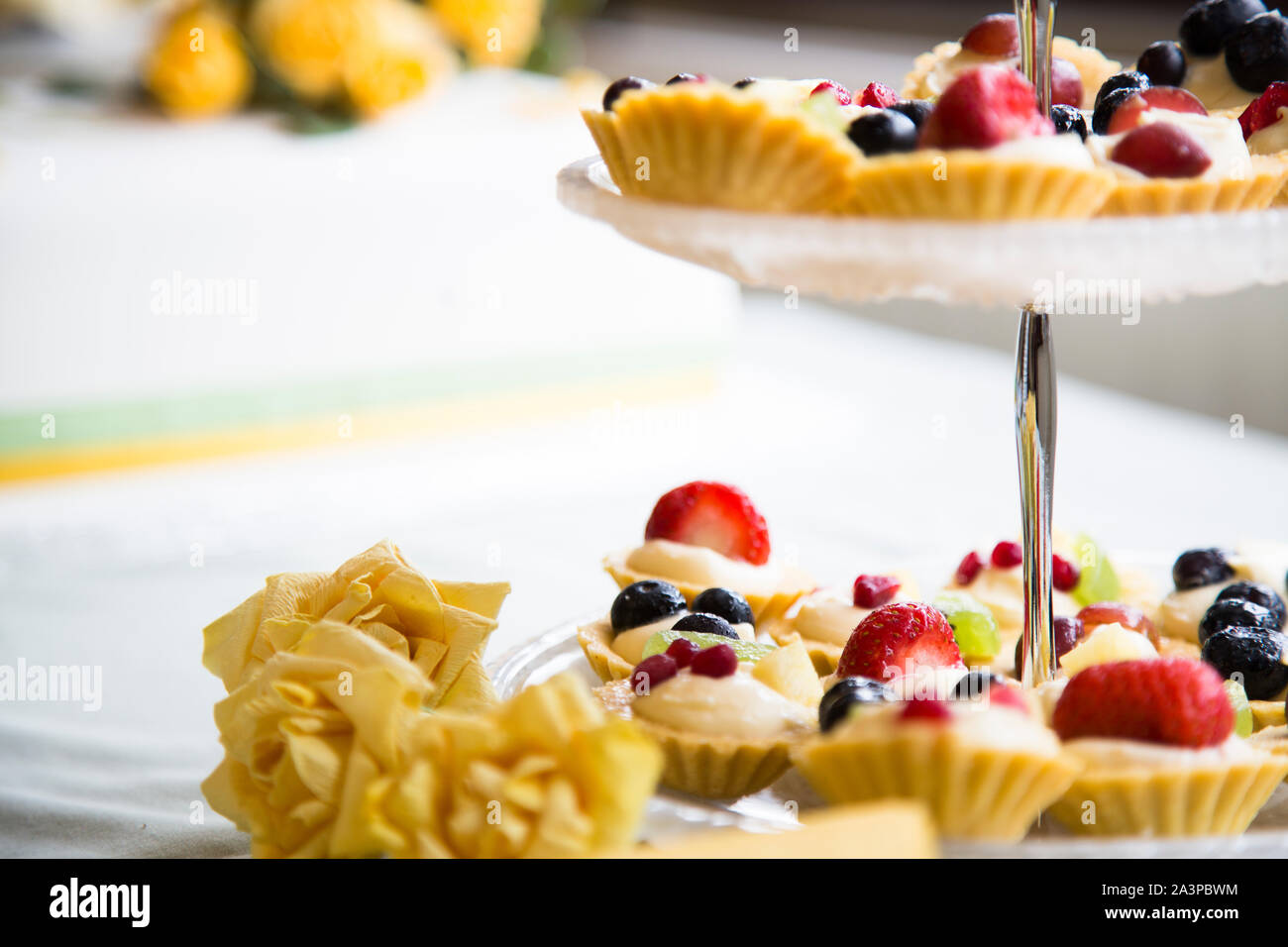 Fruit pastries presented on a multi tier platter ready for a