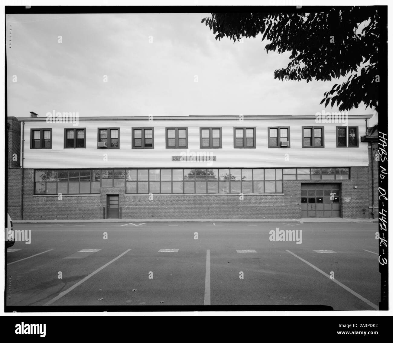 South (front) elevation, looking north at original Building No. 162 - Navy Yard, Building No. 142 English: South (front) elevation, looking north at original Building No. 162 - Navy Yard, Building No. 142, Intersection of Sicard Street & Patterson Avenue, Washington, District of Columbia, DC Stock Photo