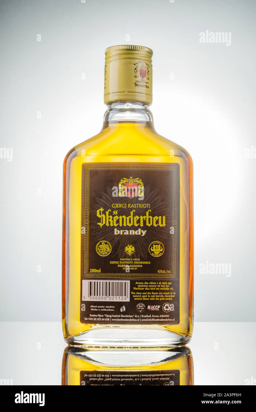 Bottle of original albanian brandy Skenderbeu on gradient background ...