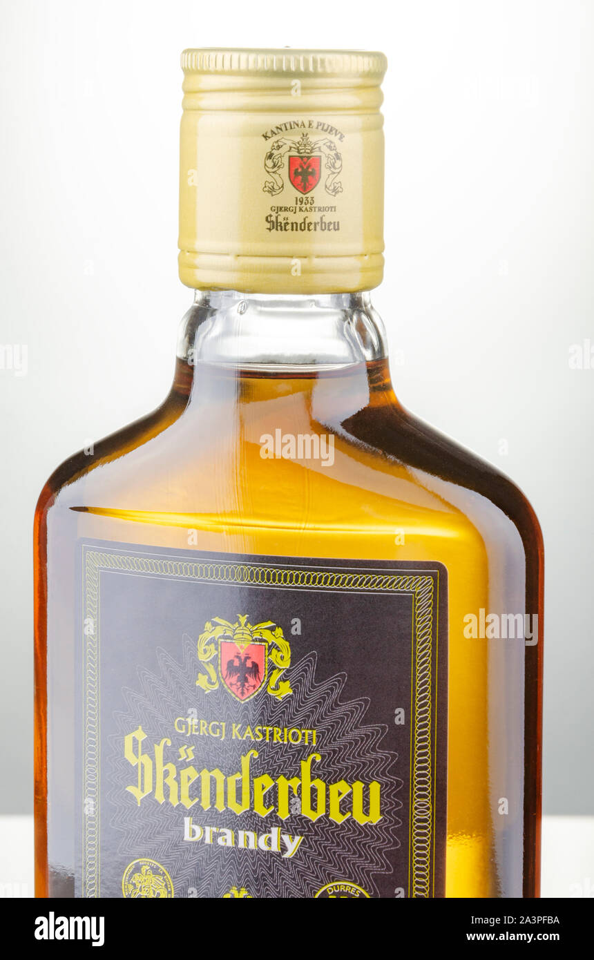 Bottle of original albanian brandy Skenderbeu on gradient background. It  has been manufactured by ADOL Ltd since 1967 Stock Photo - Alamy