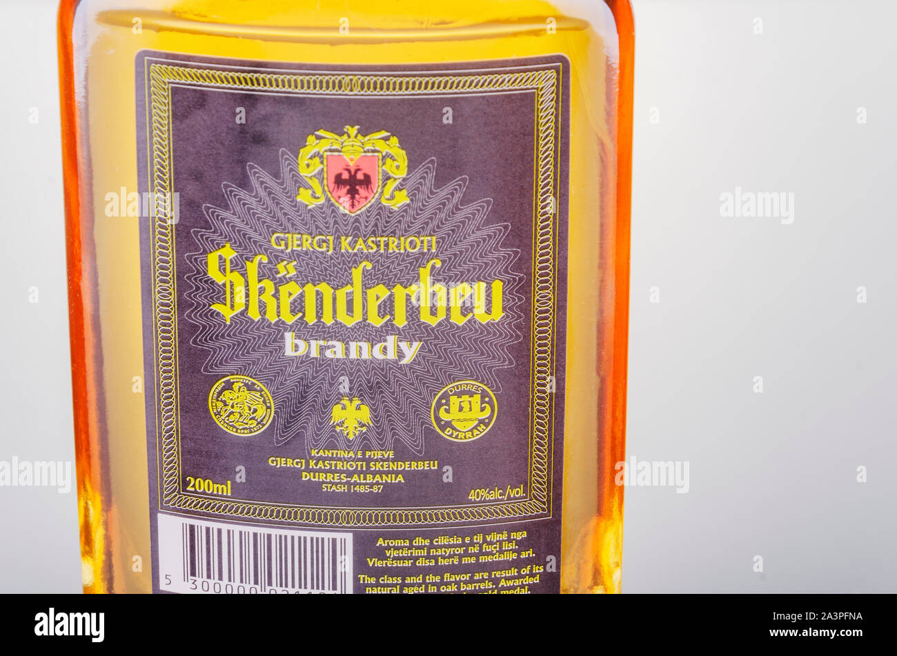 Bottle of original albanian brandy Skenderbeu on gradient background ...