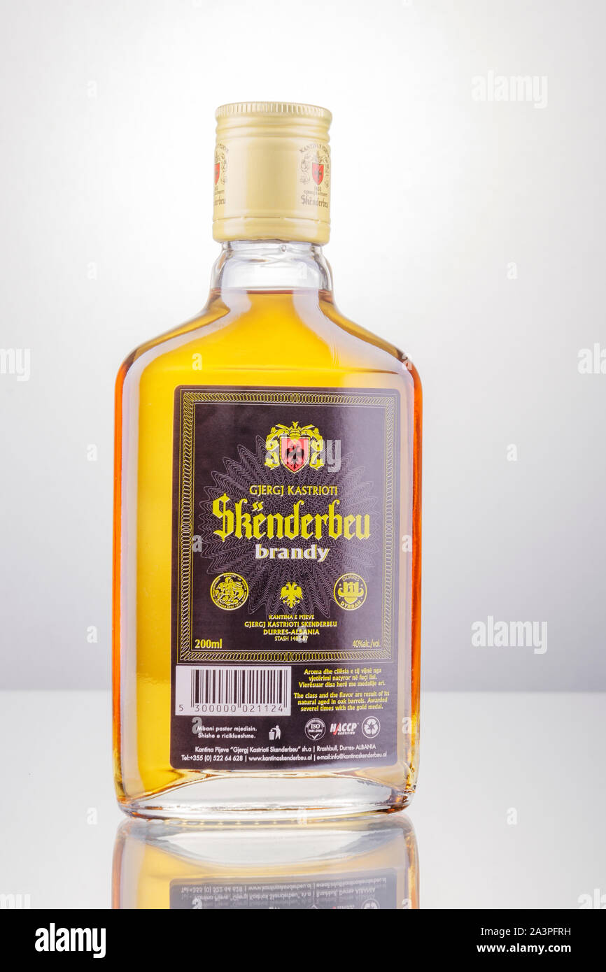 Bottle of original albanian brandy Skenderbeu on gradient background. It  has been manufactured by ADOL Ltd since 1967 Stock Photo - Alamy