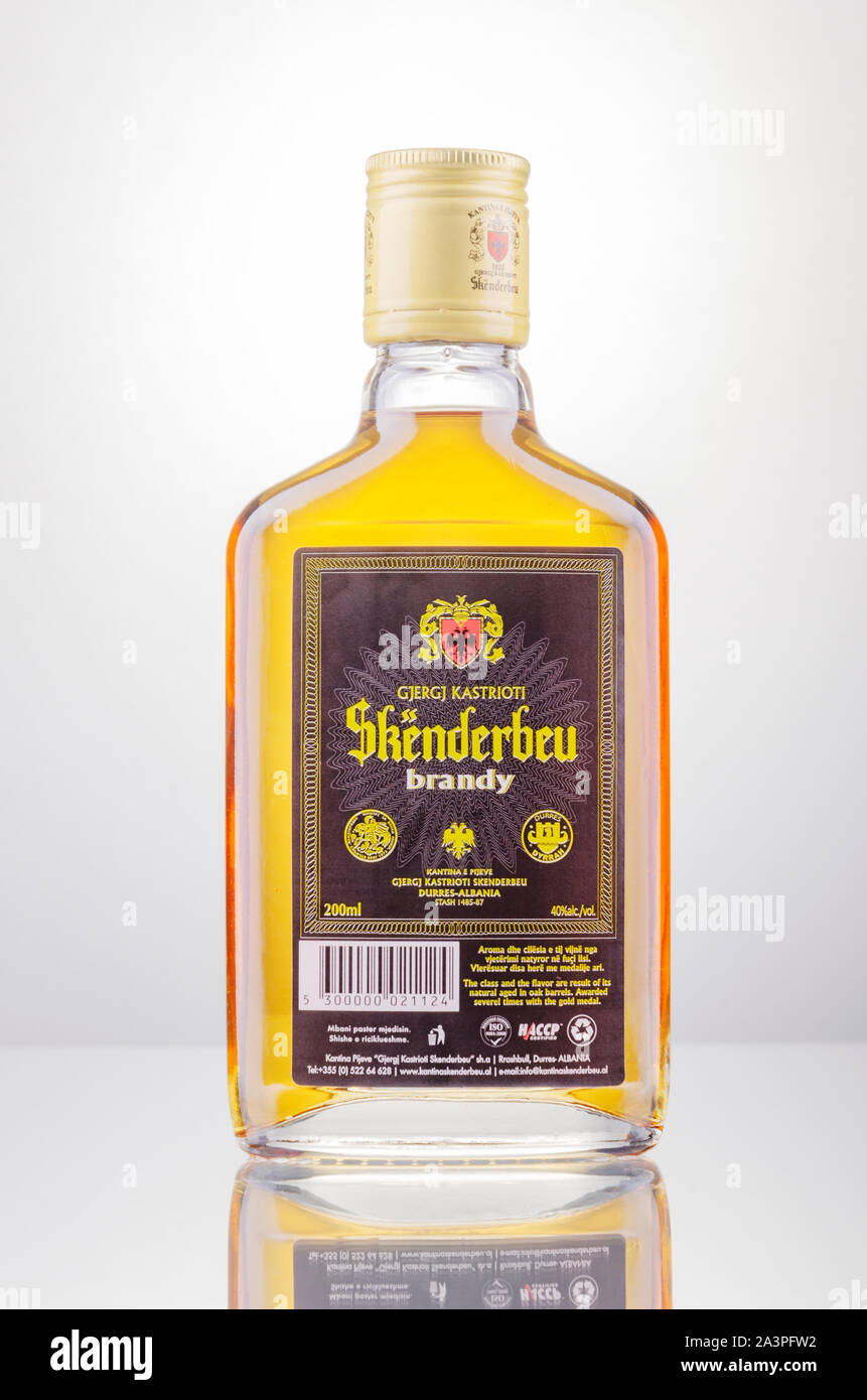 Bottle of original albanian brandy Skenderbeu on gradient background ...