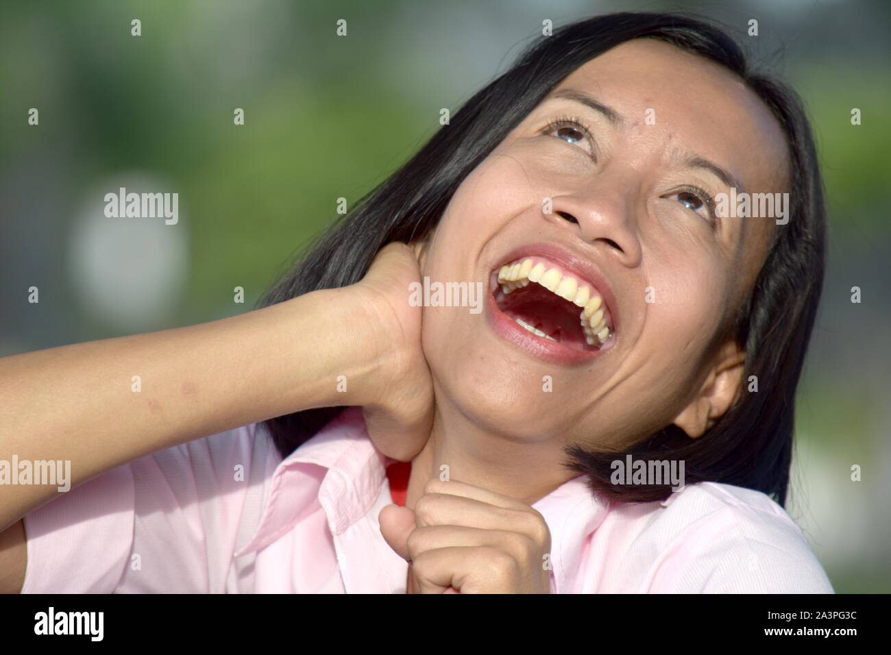 An Asian Woman Laughing Stock Photo