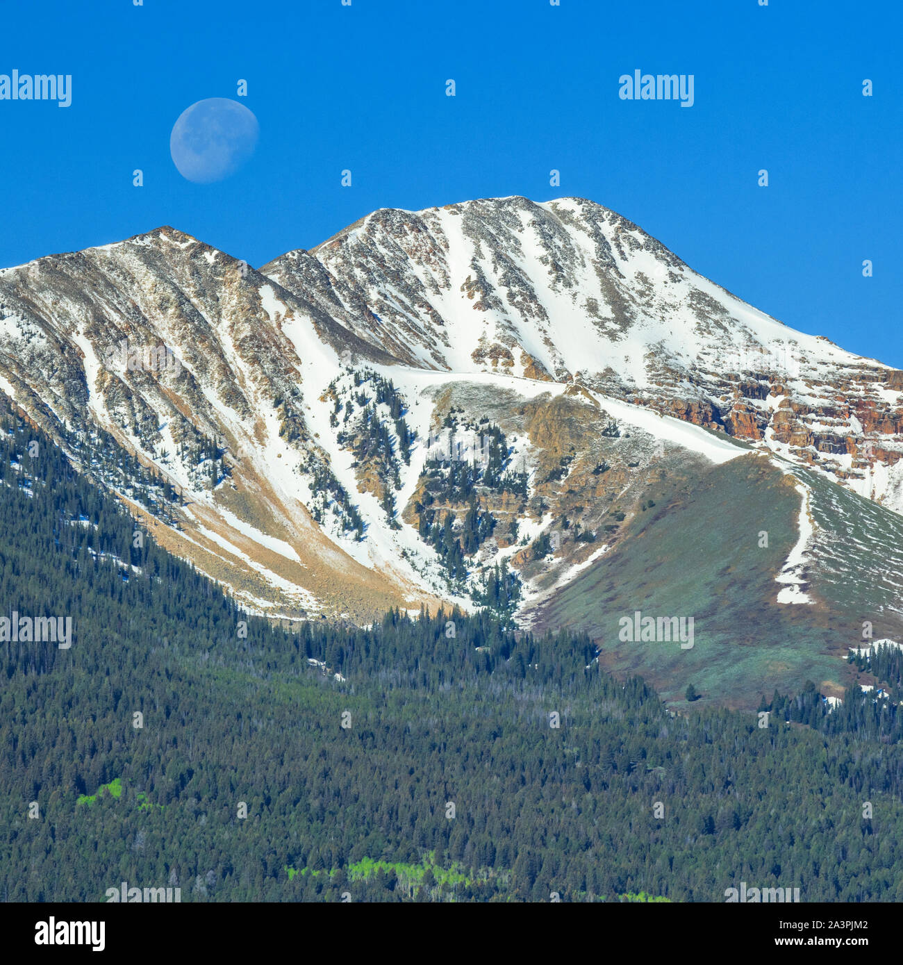 moon setting over lima peaks near lima, montana Stock Photo Alamy
