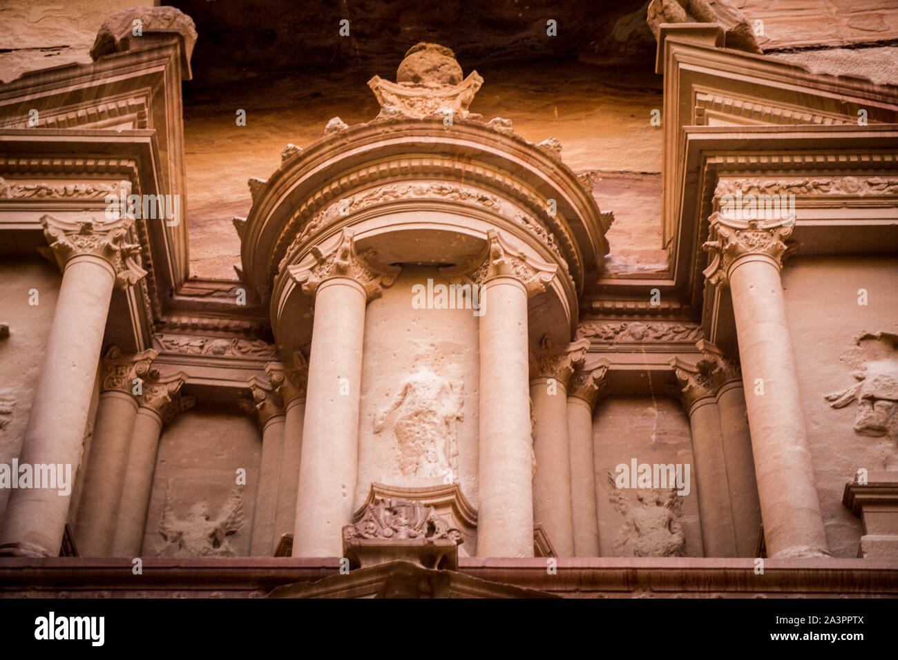 The iconic carved stone facade of The Treasury at Petra, Jordan Stock Photo