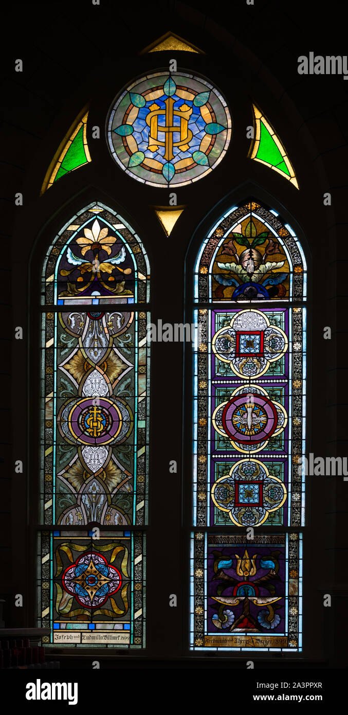 Stained-glass window at the Nativity of Mary, Blessed Virgin Catholic Church, also known as the St. Mary Catholic Church, in High Hill, a little community near Schulenburg in Fayette County, Texas Stock Photo