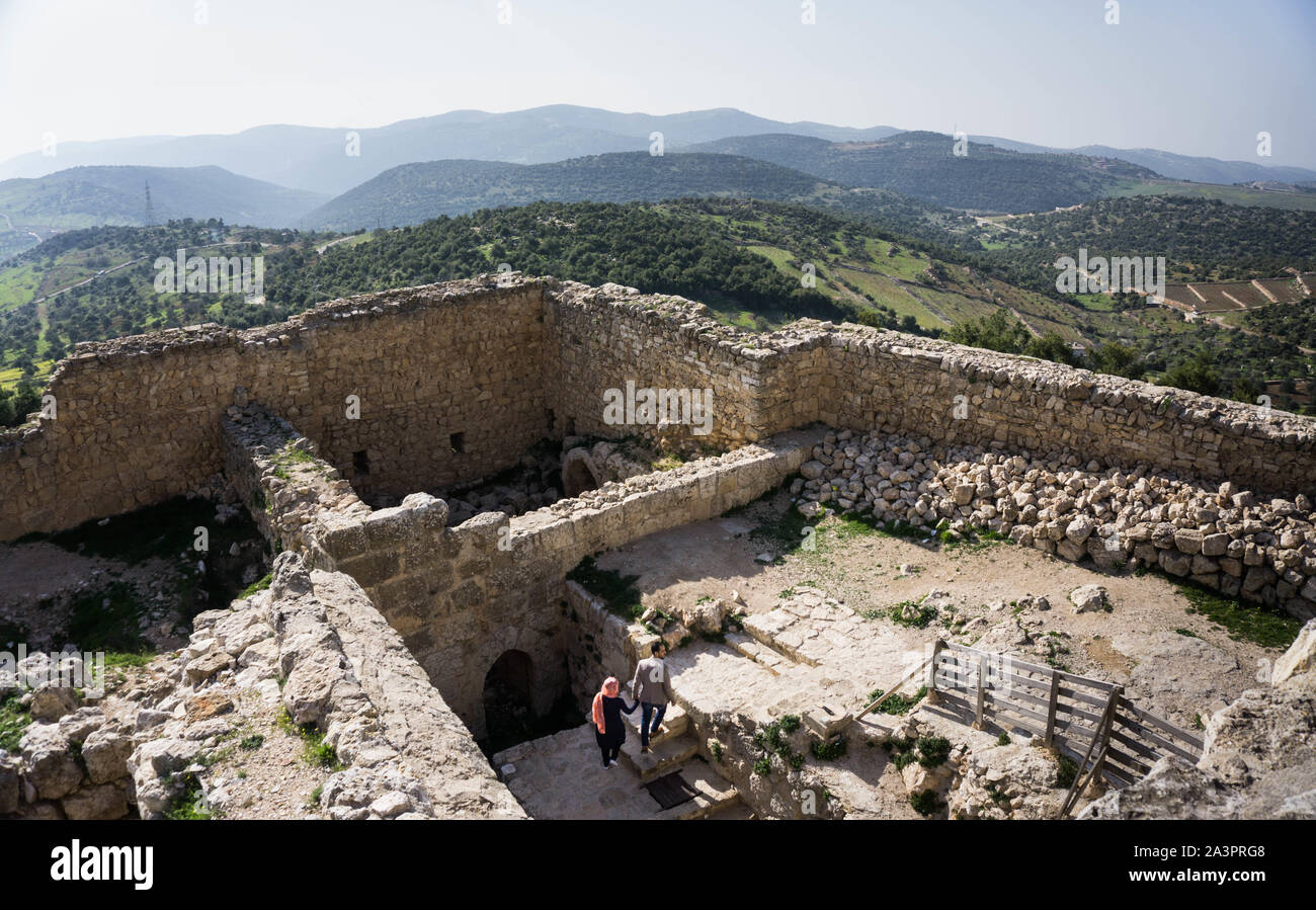 A Jordanian couple explore Ajloun Castle Stock Photo
