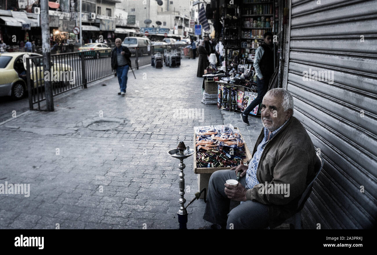 Enjoying sheesha in downtown Amman Stock Photo