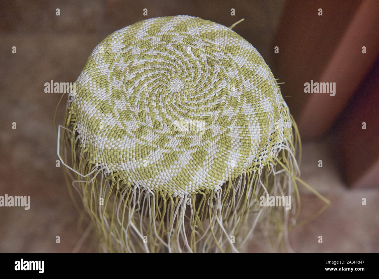 Weaving straw into a Panama hat (paja toquilla), which actually comes from Ecuador Stock Photo