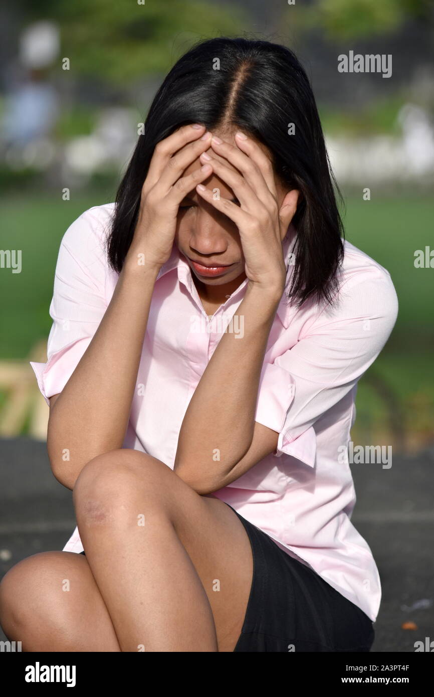 Lonely young woman looks hi-res stock photography and images - Alamy