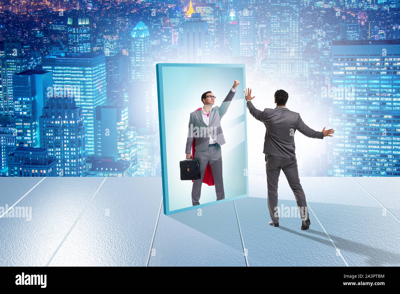 The businessman seeing himself in mirror as superhero Stock Photo - Alamy