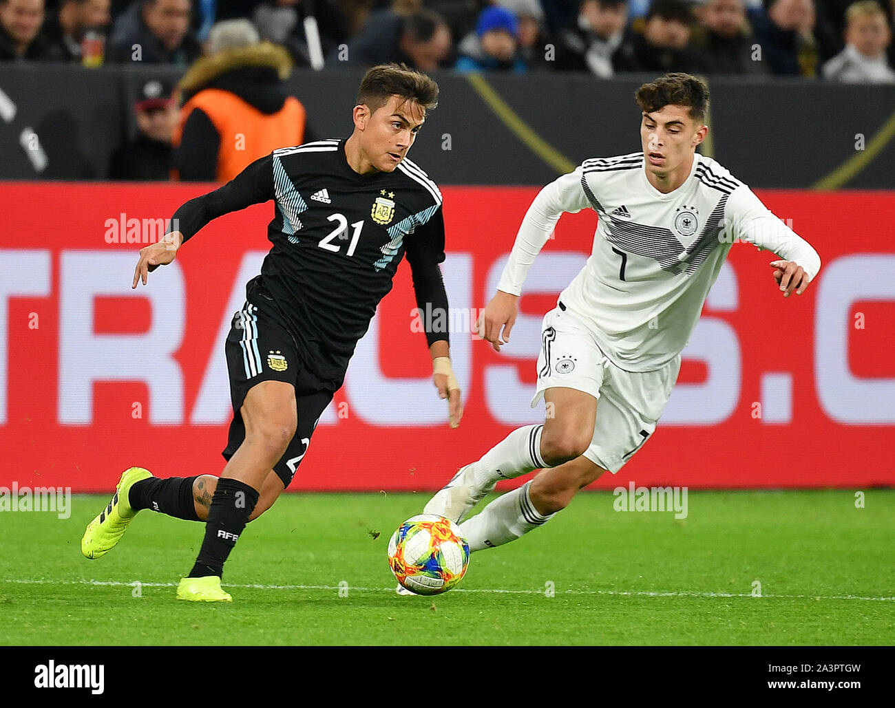 Dortmund, Germany. 9th Oct, 2019. Paulo Dybala (L) of Argentina vies with Kai Havertz of Germany during an international friendly soccer match between Germany and Argentina in Dortmund, Germany, Oct. 9, 2019. Credit: Ulrich Hufnagel/Xinhua/Alamy Live News Stock Photo