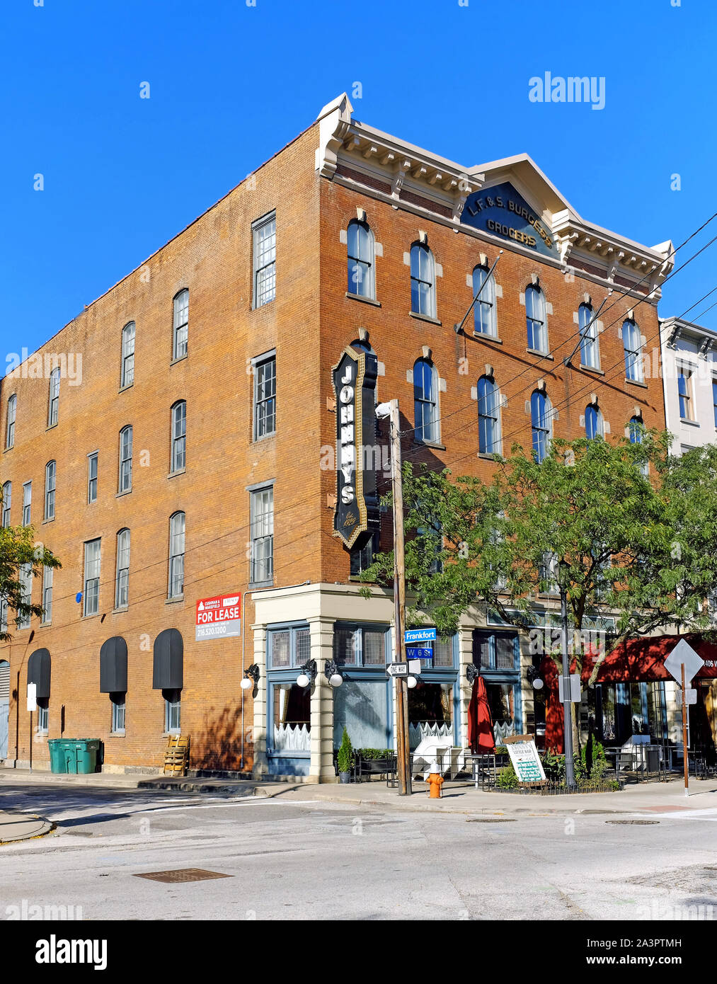 The L.F.S. and Burgess Grocers building on Frankfort Avenue and West 6th Street with Johnny's Restaurant in the Cleveland Warehouse District. Stock Photo