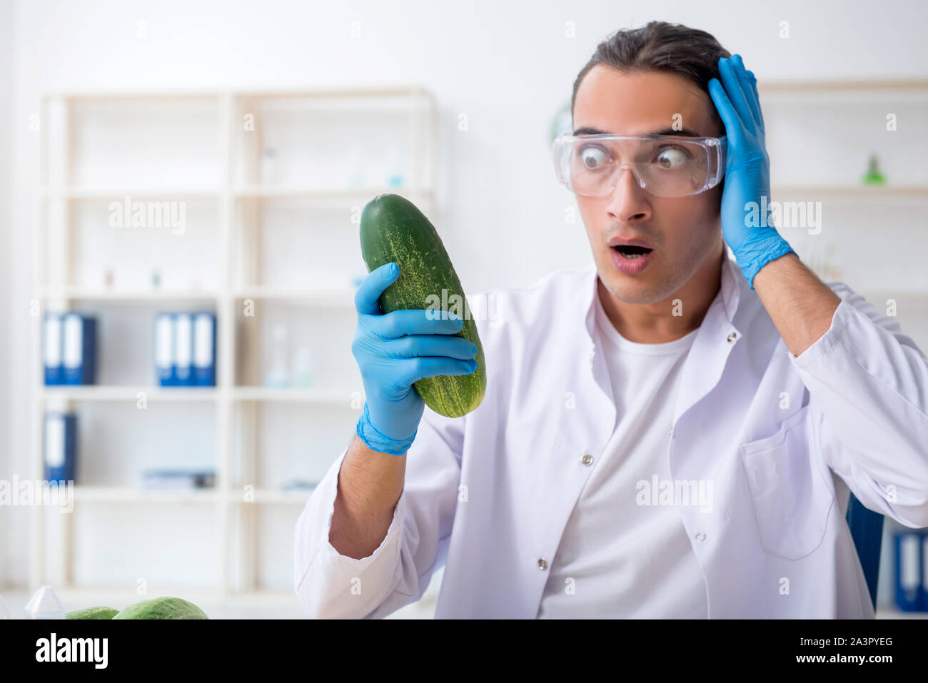 The male nutrition expert testing vegetables in lab Stock Photo - Alamy