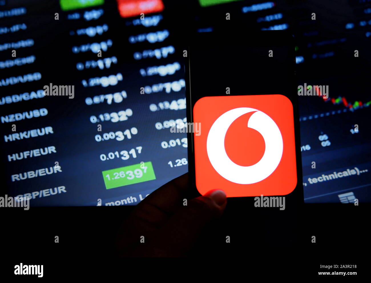 In this photo illustration a popular Telecom company Vodafone logo seen displayed on a smartphone. Stock Photo