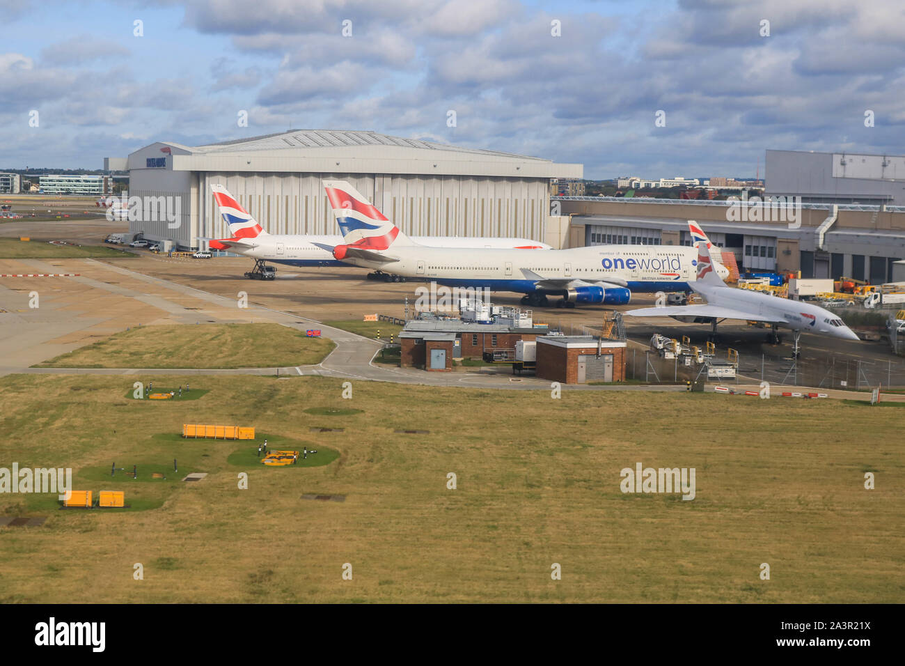A Concorde and British Airways Boeing 747 parked at Heathrow airport
