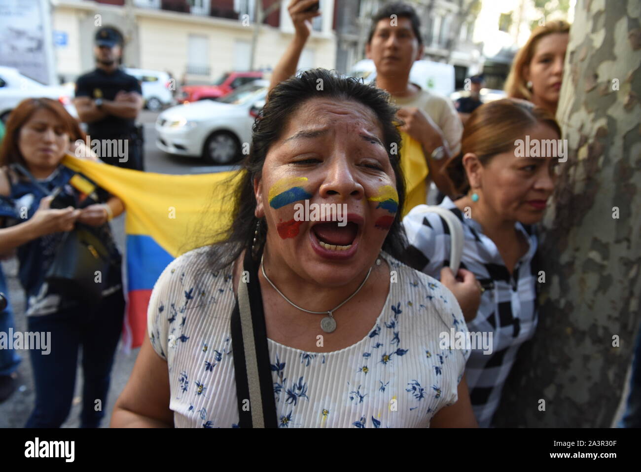 Madrid, Spain. 09th Oct, 2019. A woman shouts slogans during the protest.Ecuadorian nationals gathered in front of the Embassy of Ecuador in Madrid to protest against Lenin Moreno and his austerity measures. Credit: SOPA Images Limited/Alamy Live News Stock Photo